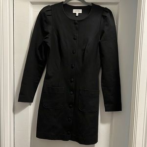 Very flattering black cocktail dress. Thick material and wears really nicely.